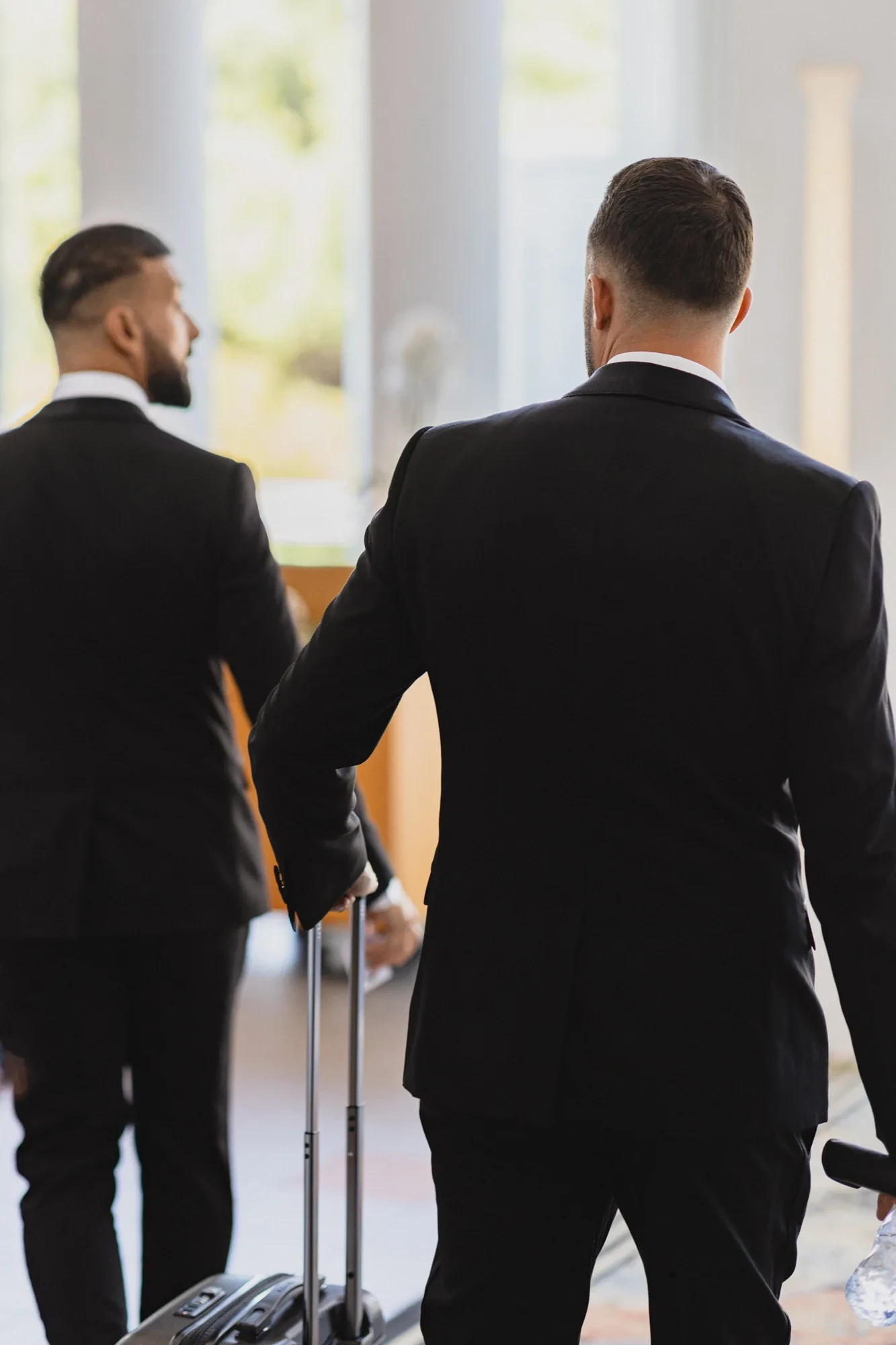 groomsmen-suits-luxury-hotel-arrival.webp groomsmen-suits-luxury-hotel-arrival.webp