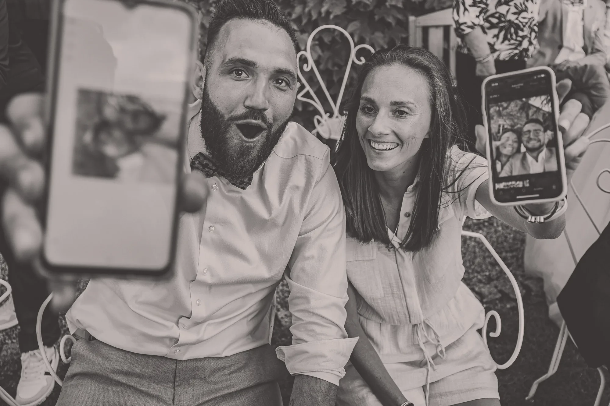 newlyweds-guests-smartphones-bw.webp newlyweds-guests-smartphones-bw.webp