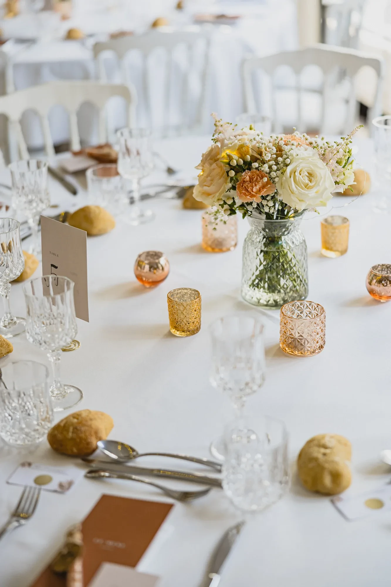 centerpiece-flowers-amber-votives.webp centerpiece-flowers-amber-votives.webp