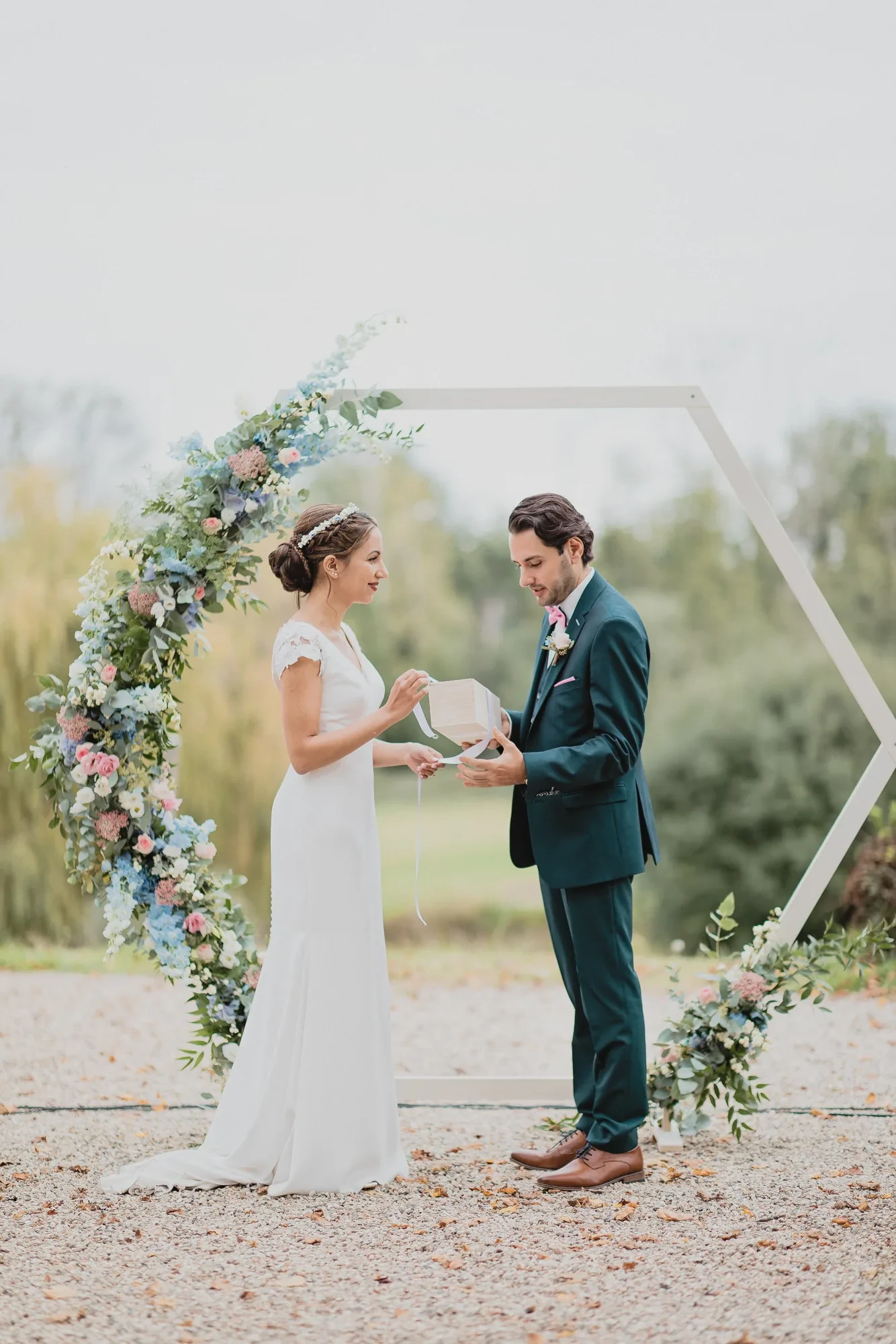 ceremony-vows-hexagonal-floral-arch.webp
