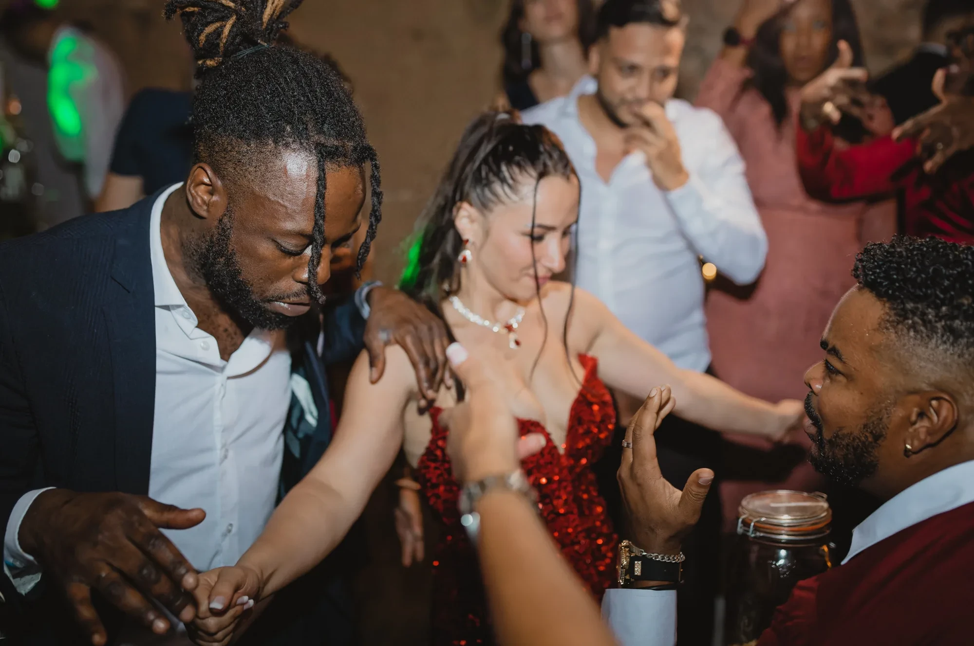 guests-dancing-red-dress-party.webp guests-dancing-red-dress-party.webp