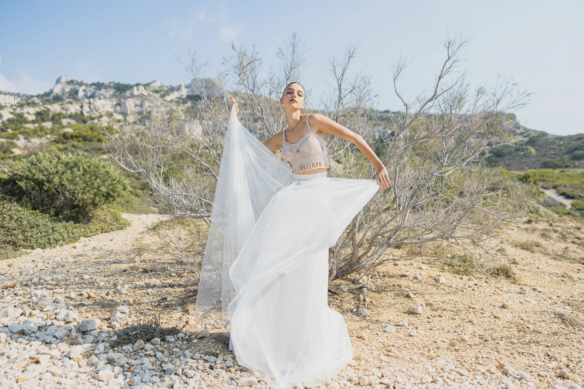 Destination Wedding Ischia Island – 2026 Planning Guide 4 bride-tulle-dress-white-rocks-coast.webp